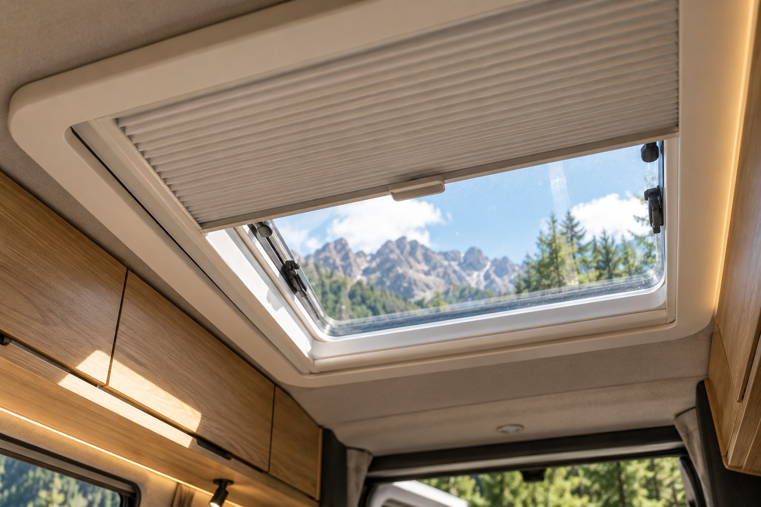 Campervan roof-window blind partly drawn